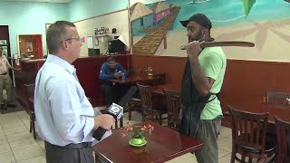 Dirty Dining Restaurant owner walks out of kitchen with machete [upl. by Einahpats]